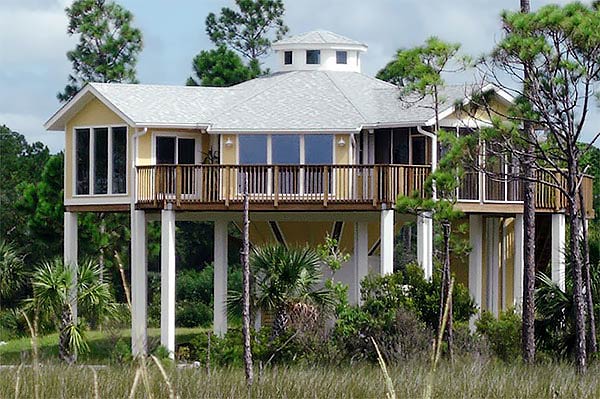 Prefab house pre-engineered stilt home hurricane-proof by Topsider Homes
