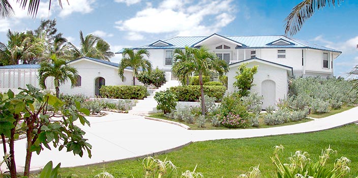 Beautiful stucco exterior oceanfront estate in Cat Cay 