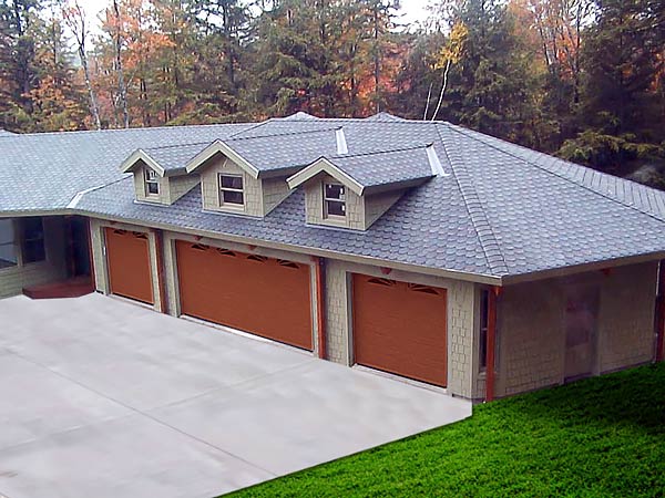 Topsider Homes Prefab 4-car Garage Kit This Topsider four-car prefab garage kit was designed to blend perfectly with the existing home structure