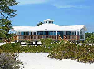 Topsider prefab home built on short stilts-piers in the Bahamas