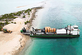 All building components and materials for this remote building site are supplied by Topsider and barged to their destination on North Andros, Bahamas.