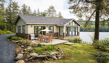 Waterfront home illustrating a slab-on-grade foundation for a relatively level site