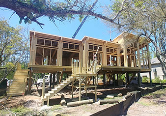 House under construction. Topsider hurricane homes are individually designed and engineered to meet client design criteria and environmental and building code requirements. Each Topsider home is a structural battleships because of our unique post & beam building system.