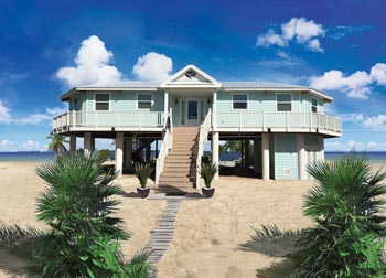 Elevated Topsider home on piling foundation built directly on a Florida Keys beachfront, engineered for hurricane-force winds