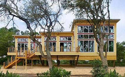 An example of a one-of-a-kind Topsider home, built on pilings and designed to be hurricane-resistant with multi-level roofline for extraordinary ocean views.