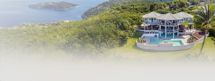 Aerial view of a Topsider multi-sided, post-and-beam home overlooking a pool in a lush tropical setting—engineered for strength, durability, and panoramic views.