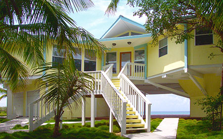 Low maintenance custom designed hurricane-resistant luxury beach house built in the Bahamas.