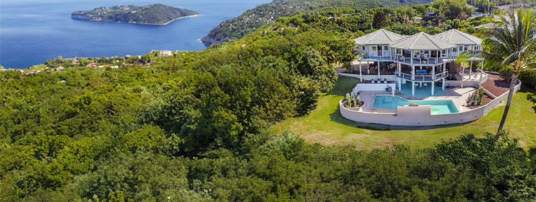Triple octagon Hawaiian home with multi-level decking and lanai, engineered for a demanding island homesite overlooking the Pacific