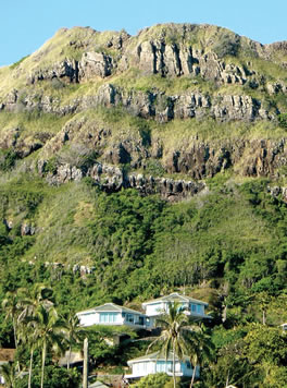 Steep Hawaiian terrain and challenging building sites like this one at Kailua, Oahu, have been Topsider's specialty for more than four decades.