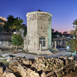 Tower of the Winds ancient octagonal marble tower in Athens Greece - historical inspiration for modern octagon houses and octagonal home designs