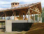 Timber frame roof trusses assembled at home building site